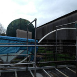 Feed hopper with augur fill